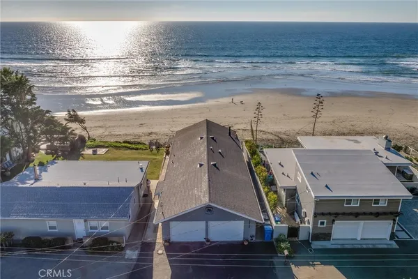a aerial view of a house with a ocean view