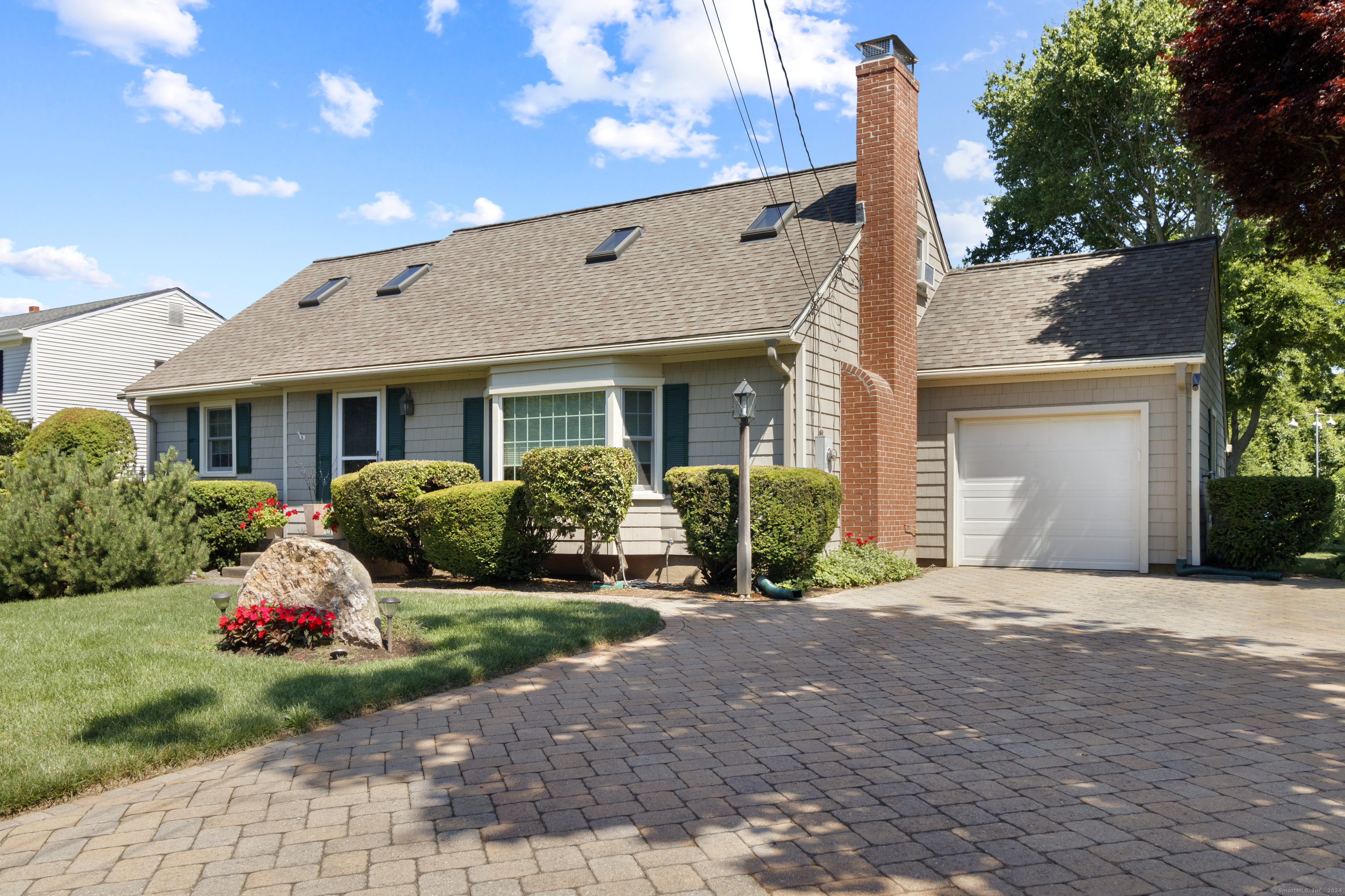 Three Bedrooms with Two Full Baths nestled on .44 Acres.