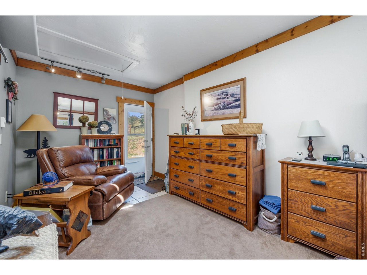 1154 Spring Valley Road Bellvue, CO 80512 - Photo 14 of 31 The primary bedroom has an exterior door