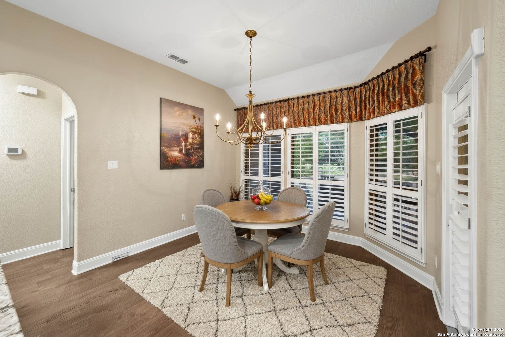 15921 Reyes Ridge Helotes, TX 78023 - Photo 14 of 68 a dining room with furniture window and wooden floor