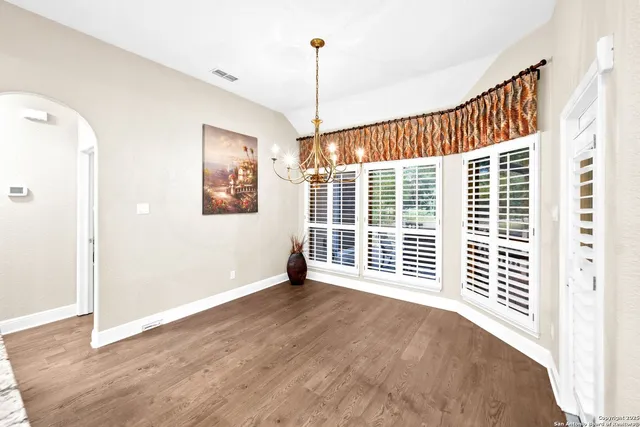 a bathroom with 2 sink tub and a mirror