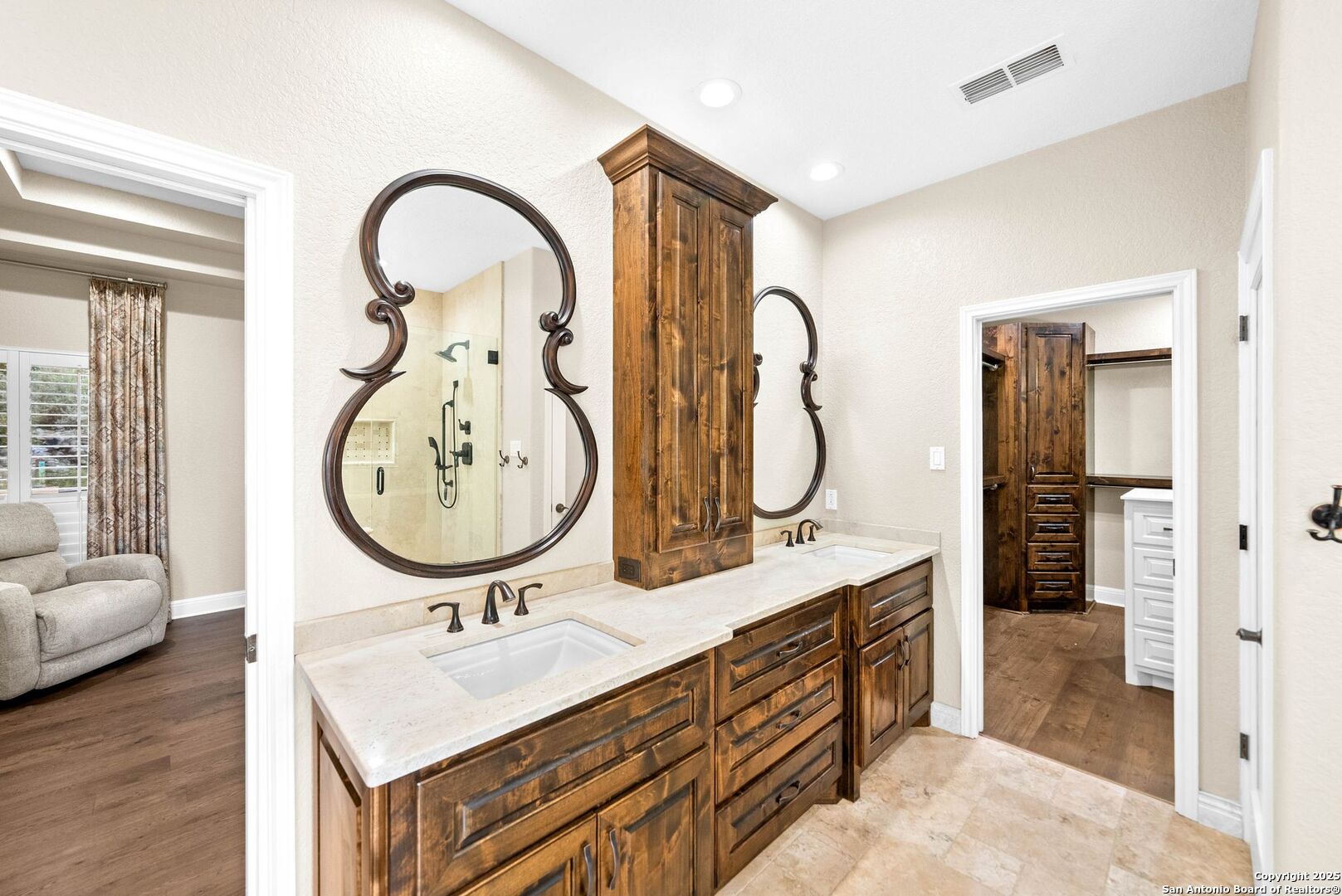 15921 Reyes Ridge Helotes, TX 78023 - Photo 20 of 68 a bathroom with 2 sink tub and a mirror