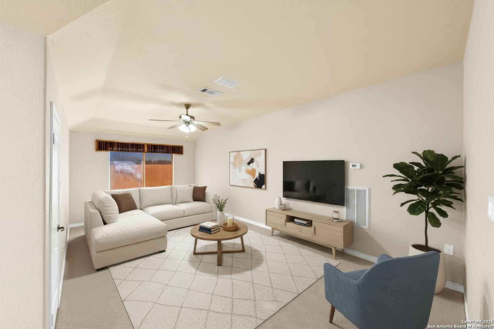 15921 Reyes Ridge Helotes, TX 78023 - Photo 26 of 68 a living room with furniture and a flat screen tv