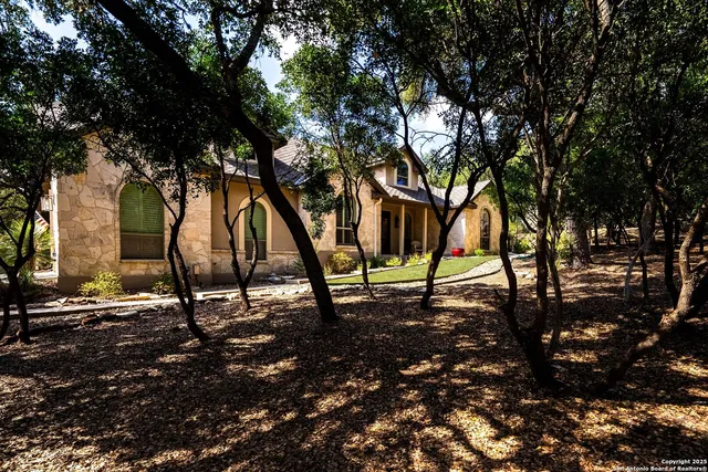 a view of a swimming pool with an outdoor space and seating area