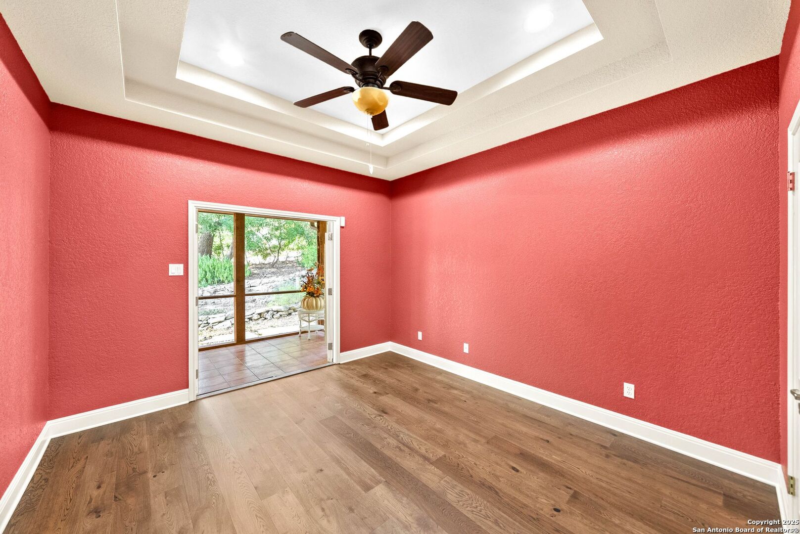 15921 Reyes Ridge Helotes, TX 78023 - Photo 37 of 68 an empty room with a window and a ceiling fan