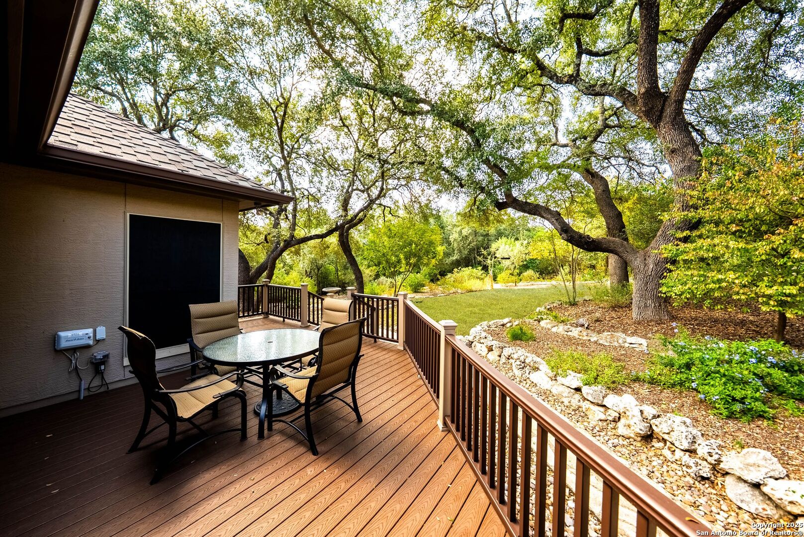 15921 Reyes Ridge Helotes, TX 78023 - Photo 42 of 68 a view of a chairs and table in the balcony