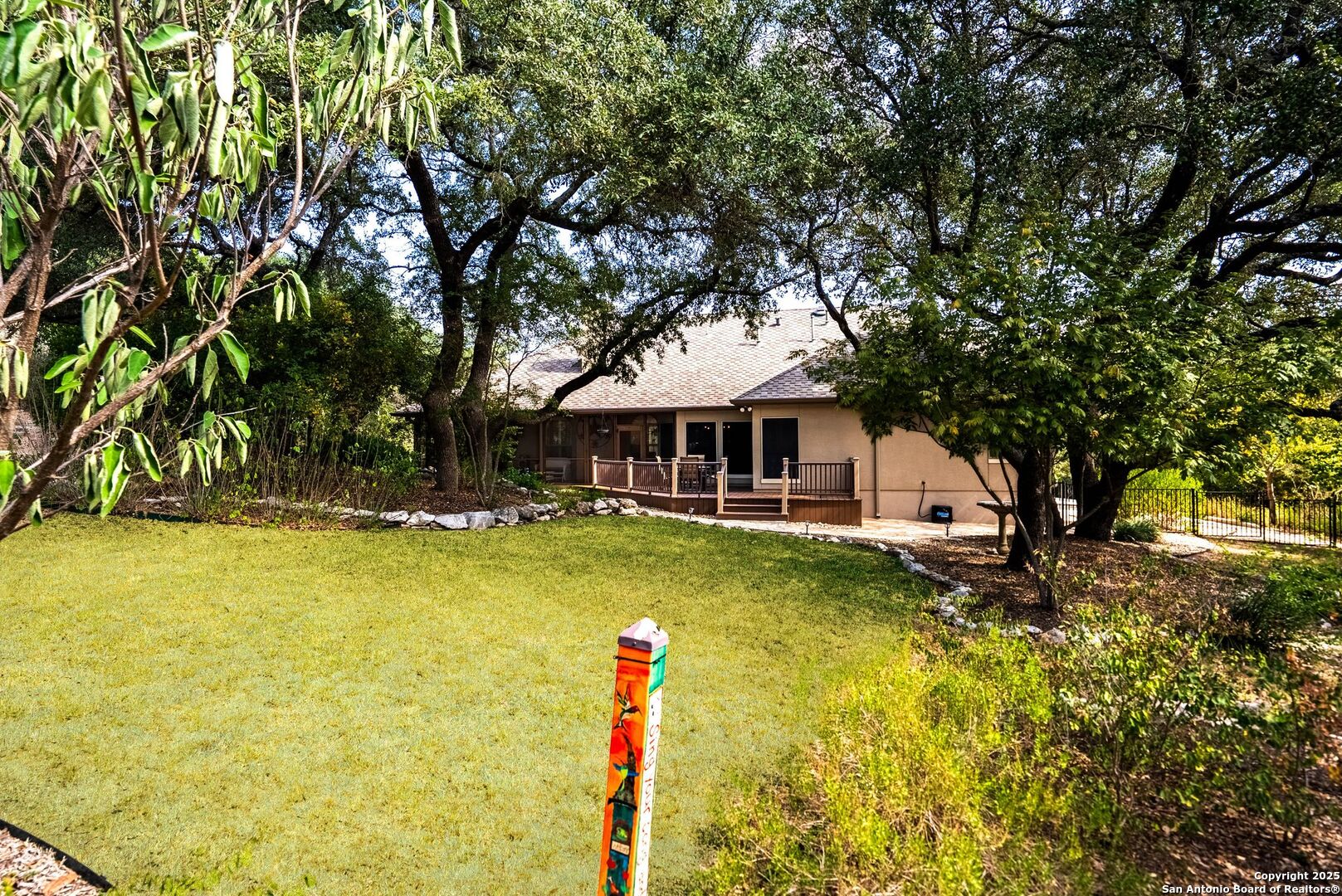 15921 Reyes Ridge Helotes, TX 78023 - Photo 45 of 68 a front view of a house with swimming pool
