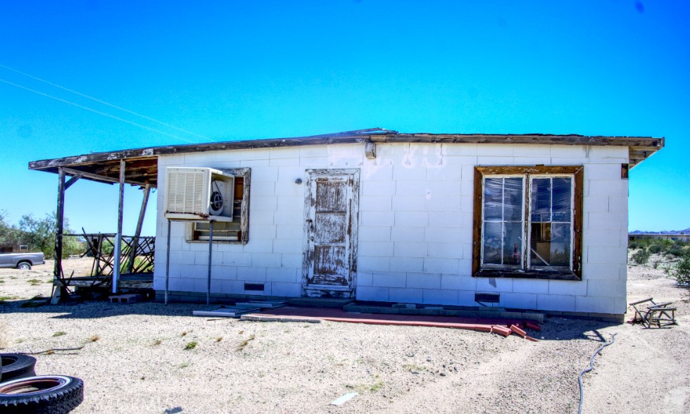 80422 Baseline Road Twentynine Palms, CA 92277 - Photo 15 of 30 a front view of a house with parking area