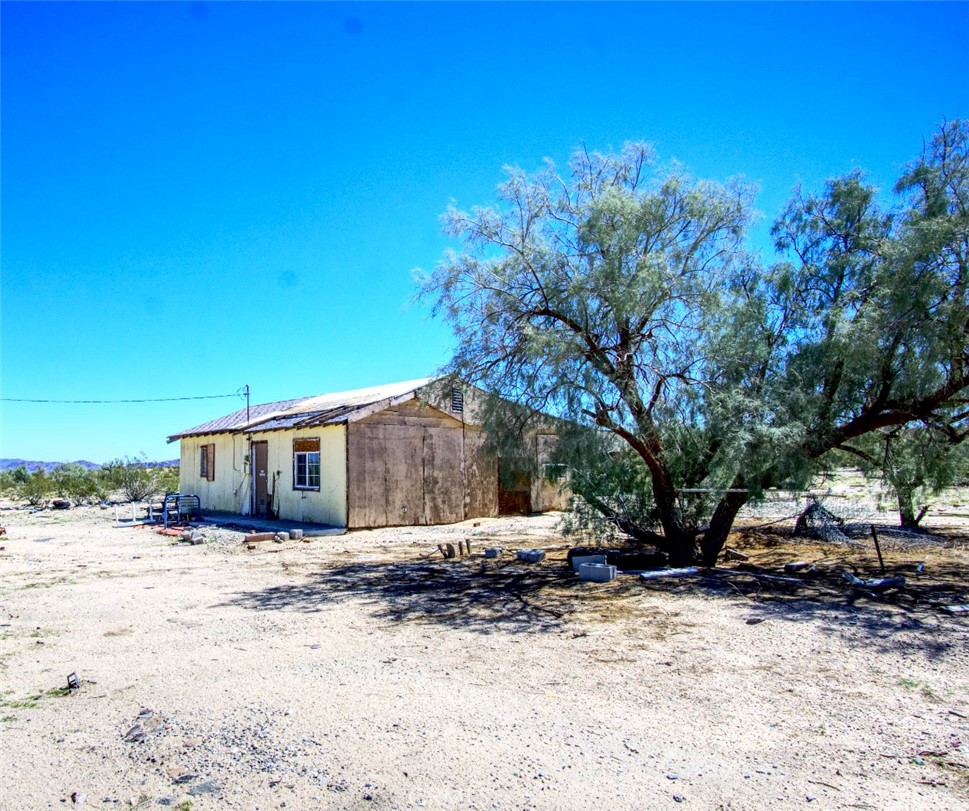 80422 Baseline Road Twentynine Palms, CA 92277 - Photo 16 of 30 a view of a house with a yard
