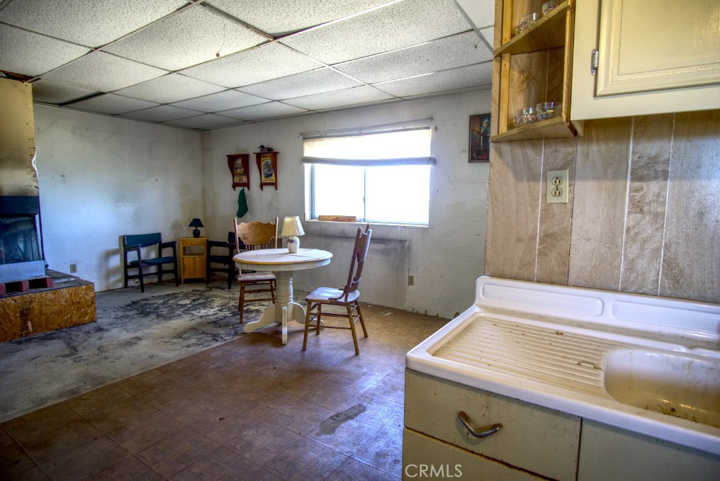 80422 Baseline Road Twentynine Palms, CA 92277 - Photo 26 of 30 a living room with furniture and a window