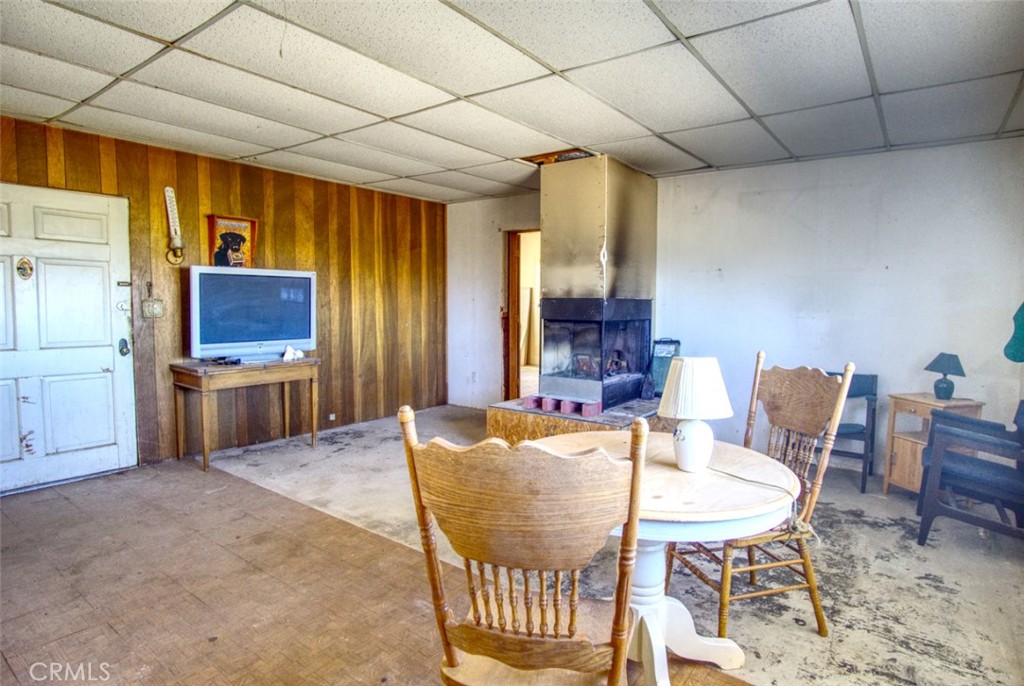 80422 Baseline Road Twentynine Palms, CA 92277 - Photo 30 of 30 a dining room with furniture and wooden floor