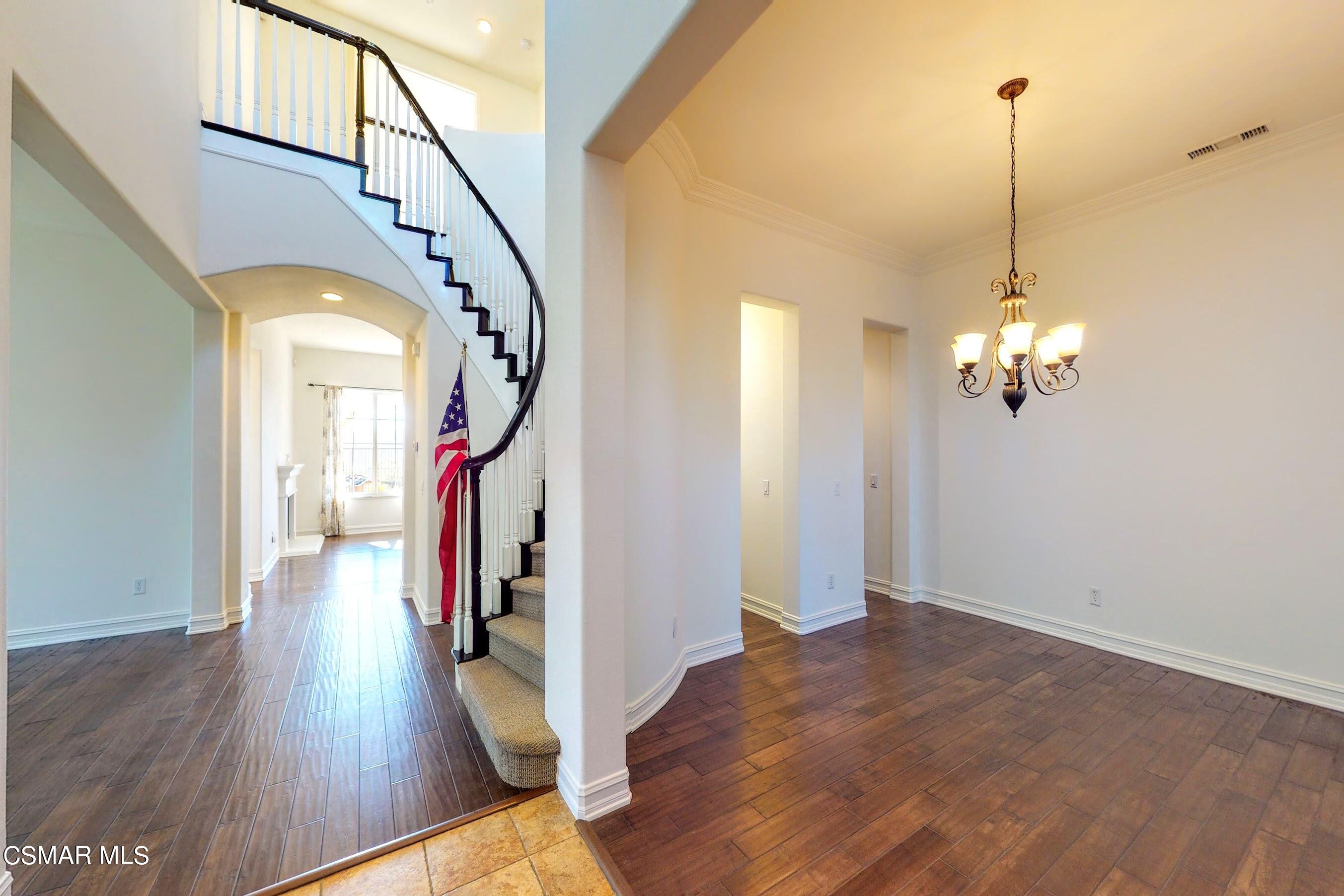 3705 Horizon Ridge Court Simi Valley, CA 93063 - Photo 20 of 62 a view of a hallway with wooden floor and staircase