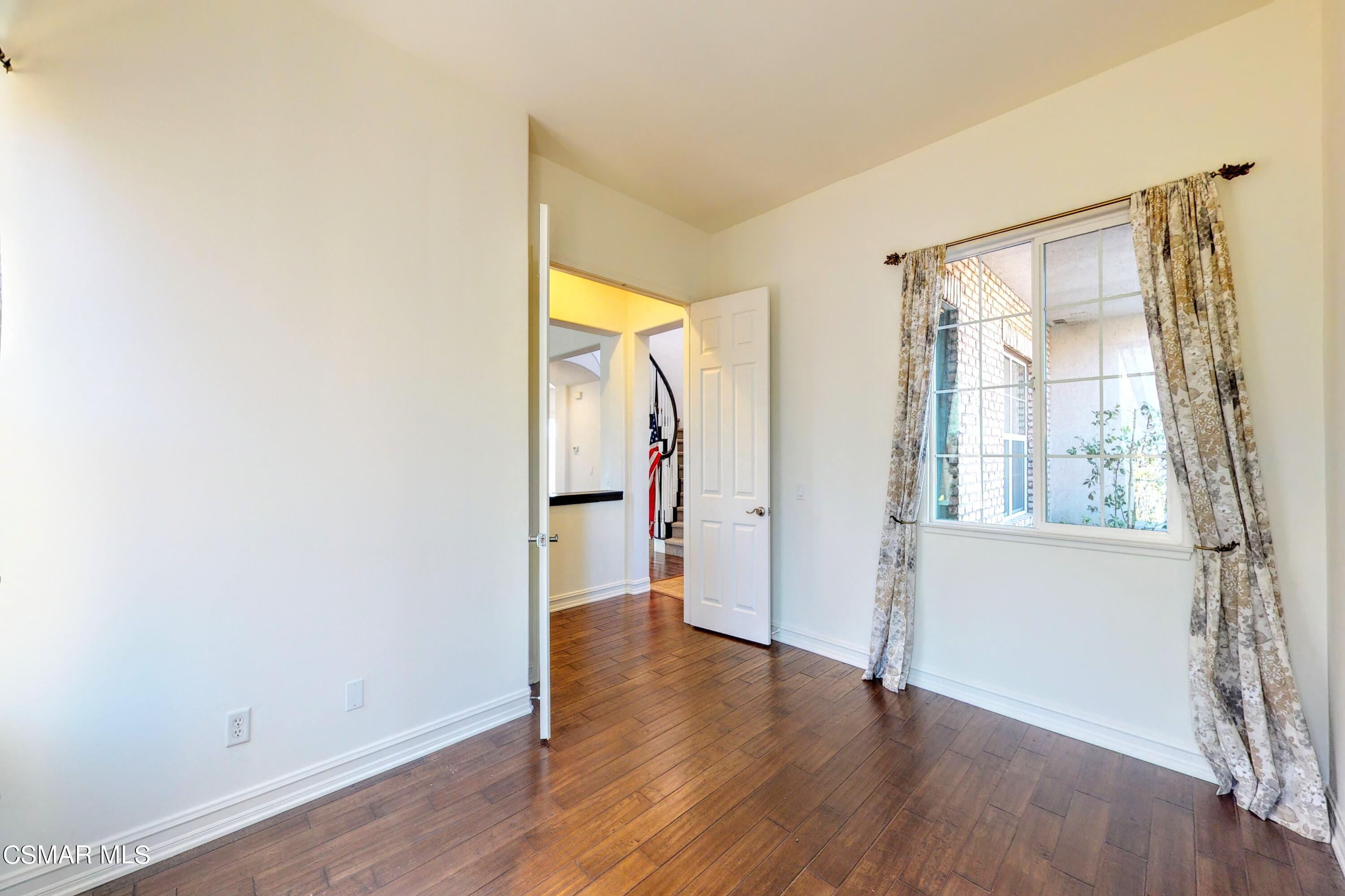 3705 Horizon Ridge Court Simi Valley, CA 93063 - Photo 33 of 62 a view of empty room with wooden floor and fan
