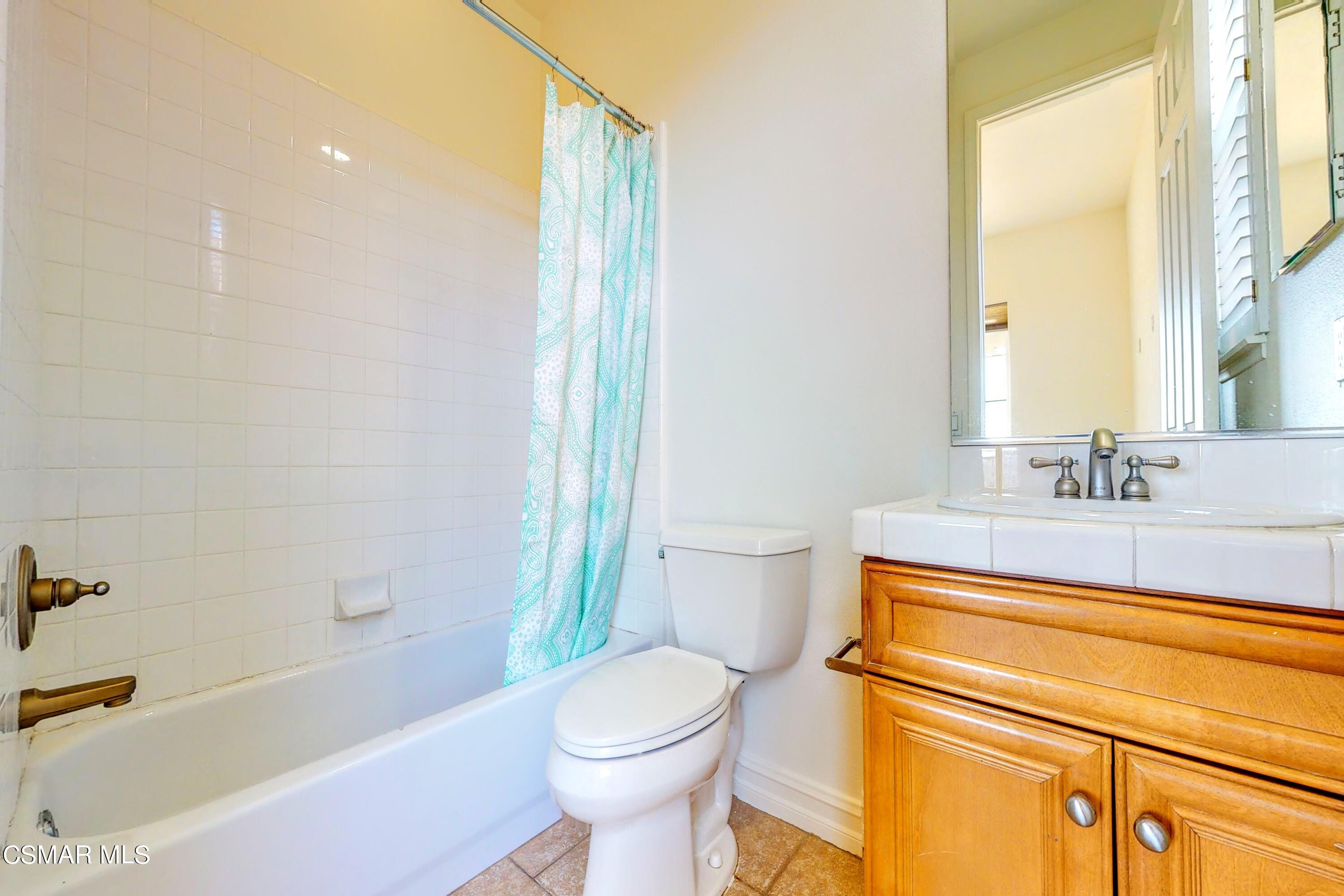 3705 Horizon Ridge Court Simi Valley, CA 93063 - Photo 35 of 62 a bathroom with a sink toilet and shower