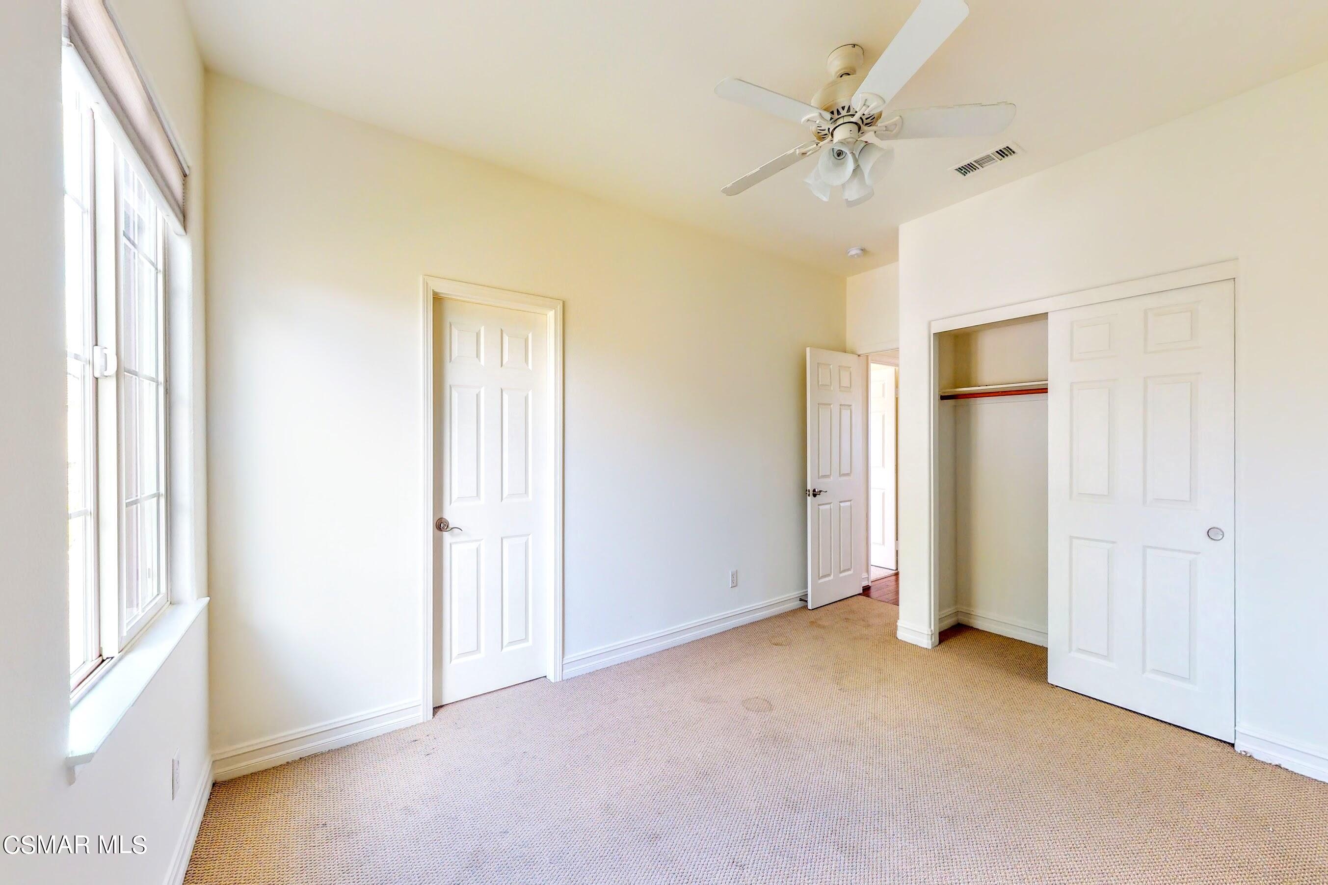 3705 Horizon Ridge Court Simi Valley, CA 93063 - Photo 50 of 62 a view of a big room with windows and chandelier fan