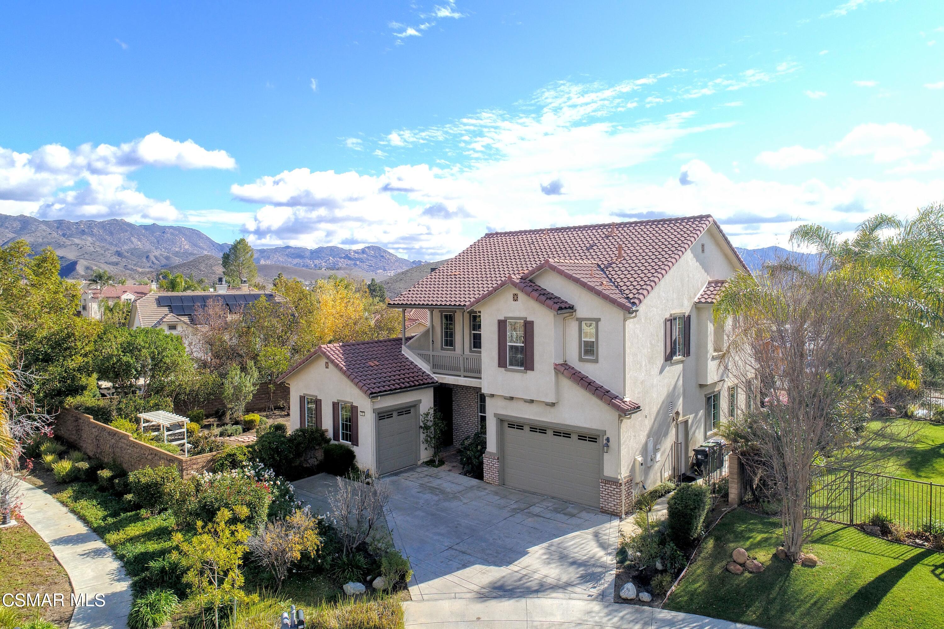 3705 Horizon Ridge Court Simi Valley, CA 93063 - Photo 5 of 62 a aerial view of a house with a big yard plants and large trees