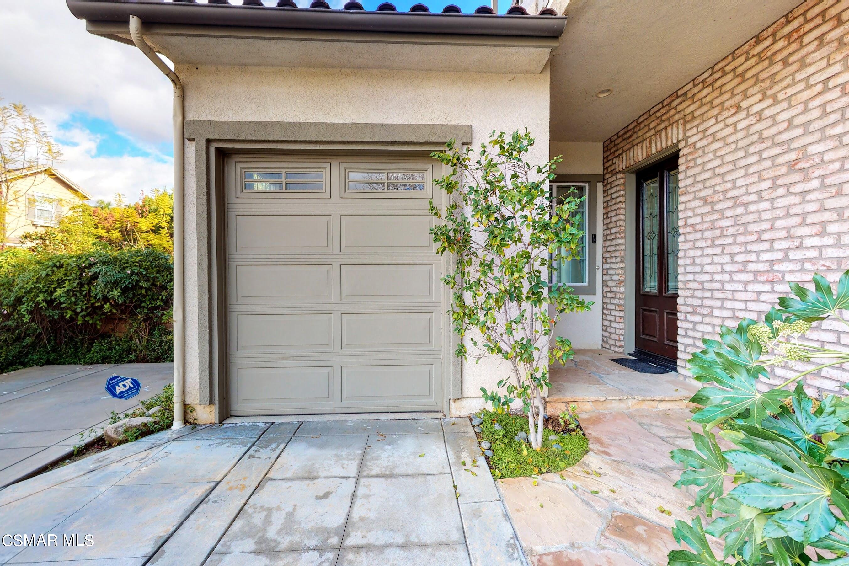 3705 Horizon Ridge Court Simi Valley, CA 93063 - Photo 60 of 62 a potted plant in front of a door