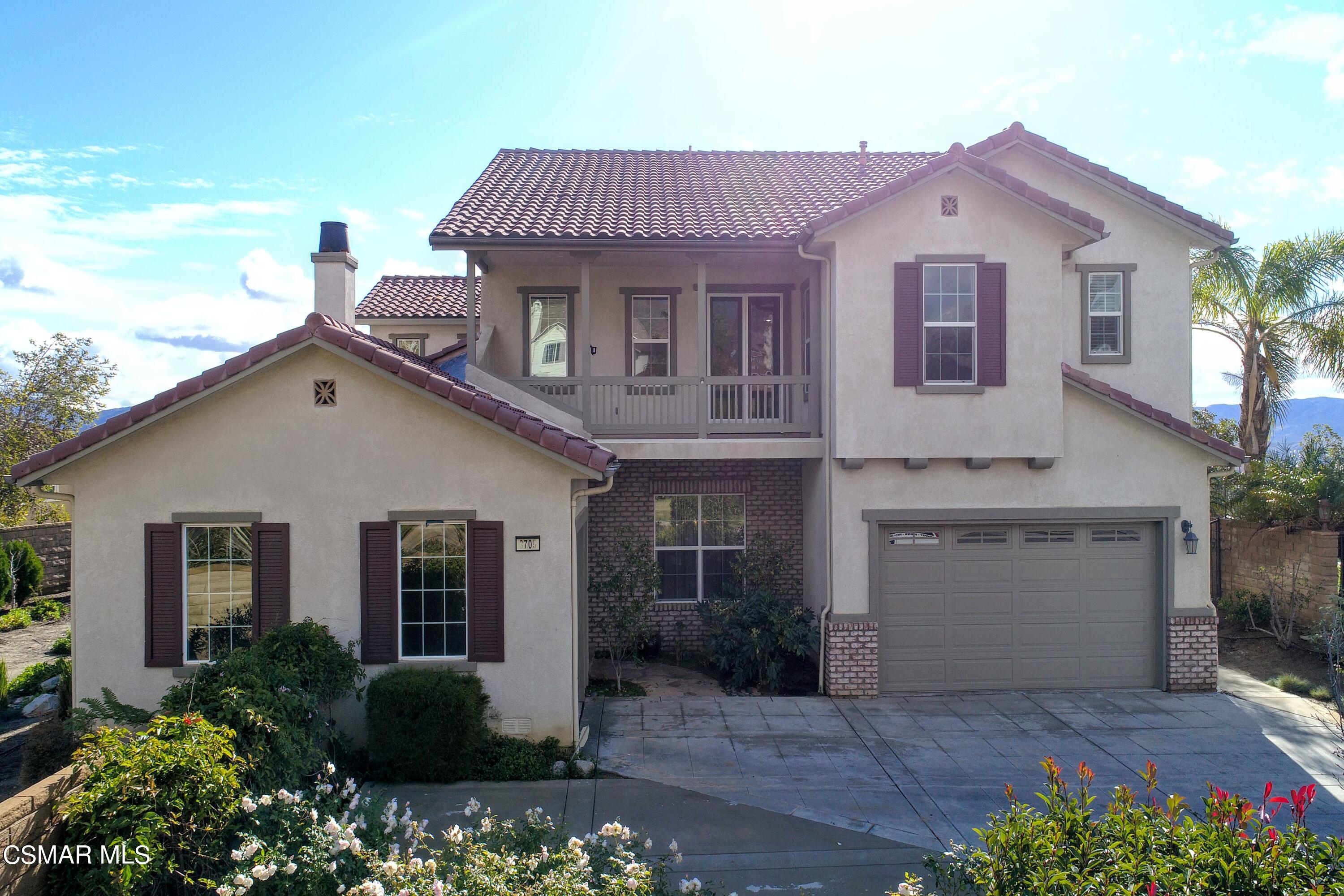 3705 Horizon Ridge Court Simi Valley, CA 93063 - Photo 6 of 62 a front view of a house with a garden