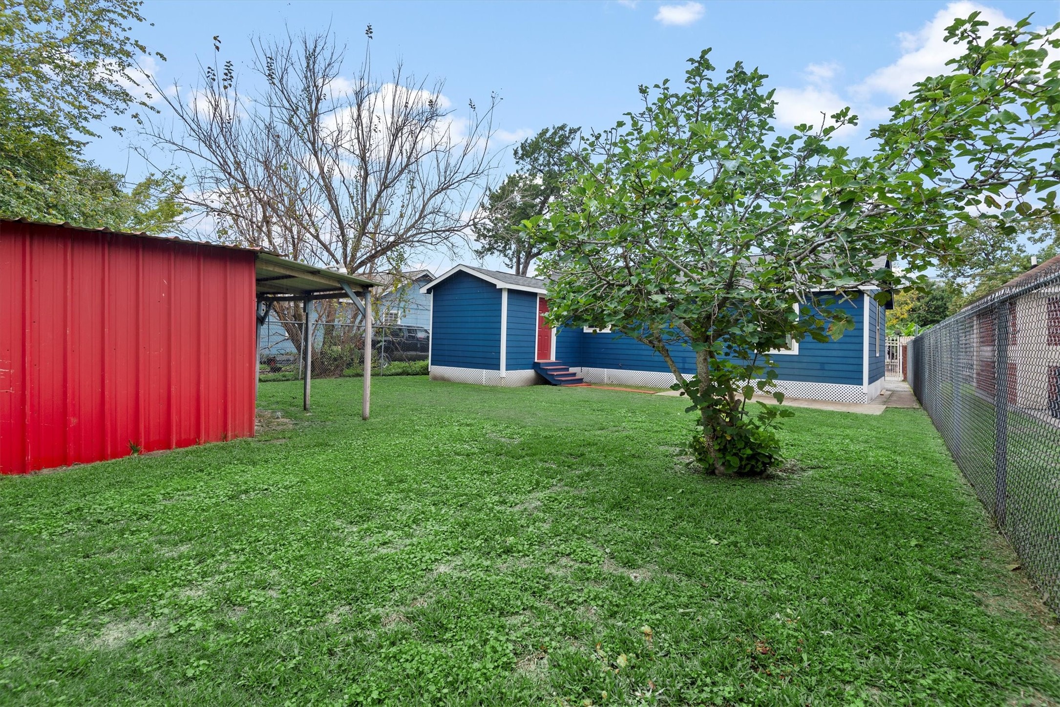 3914 Cetti Street Houston, TX 77009 - Photo 19 of 22 a view of backyard of house with green space