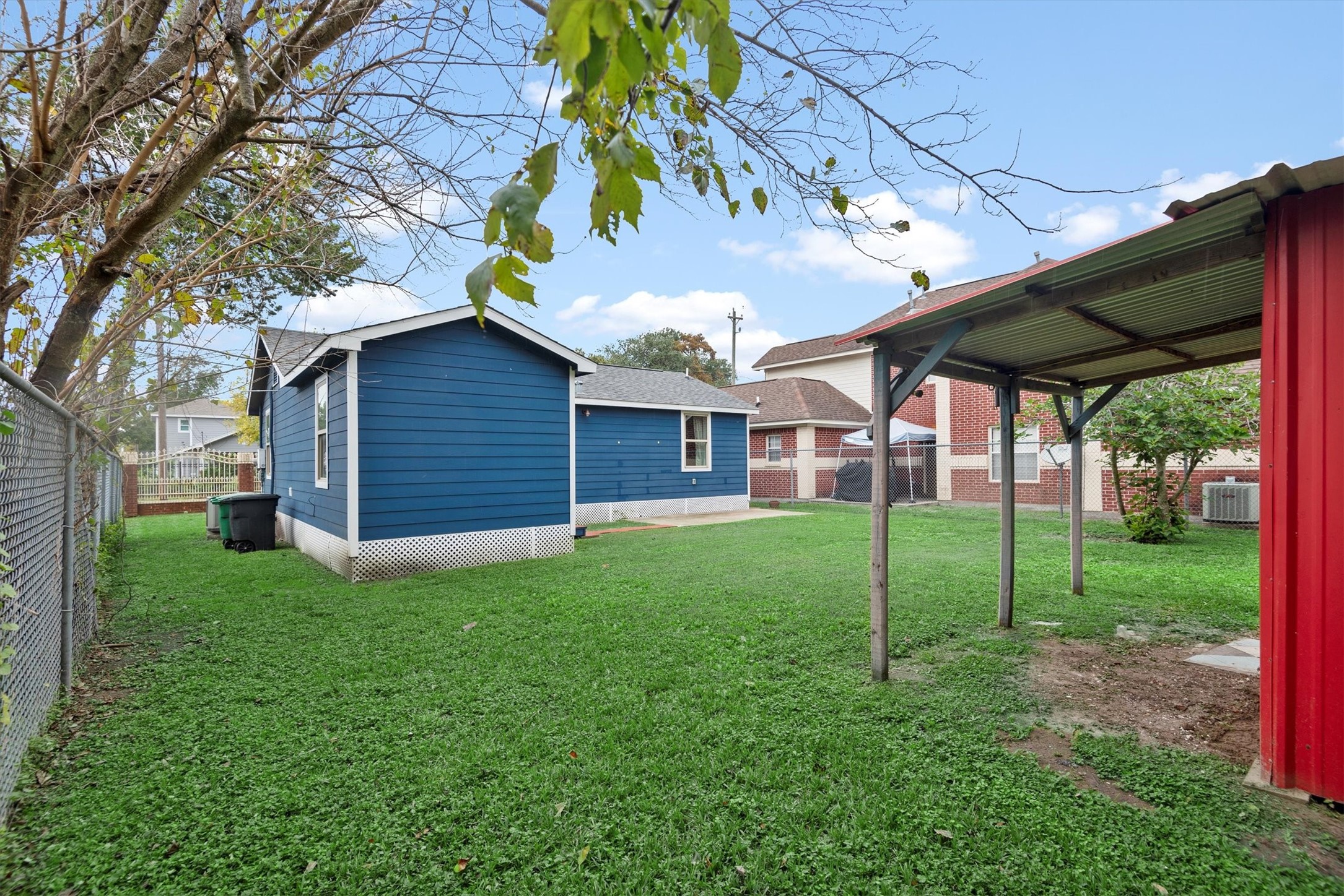 3914 Cetti Street Houston, TX 77009 - Photo 21 of 22 a view of a backyard with plants and large tree