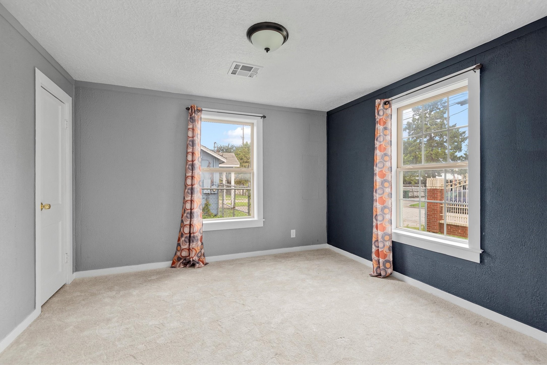 3914 Cetti Street Houston, TX 77009 - Photo 10 of 22 a view of an empty room with a window