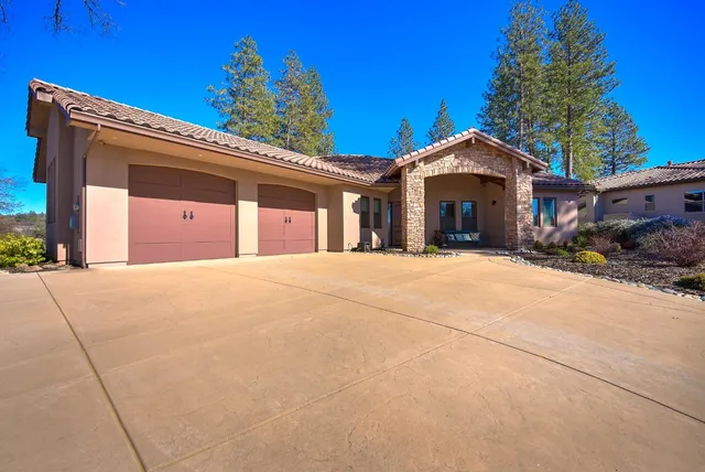 a living room with furniture fireplace and a flat screen tv