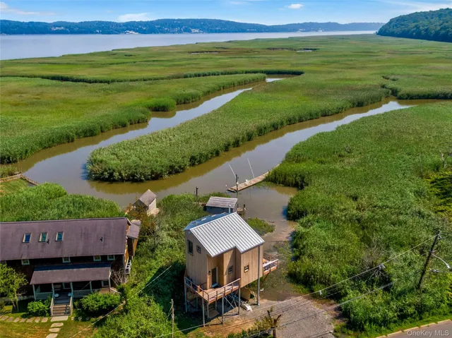 an aerial view of a house with garden