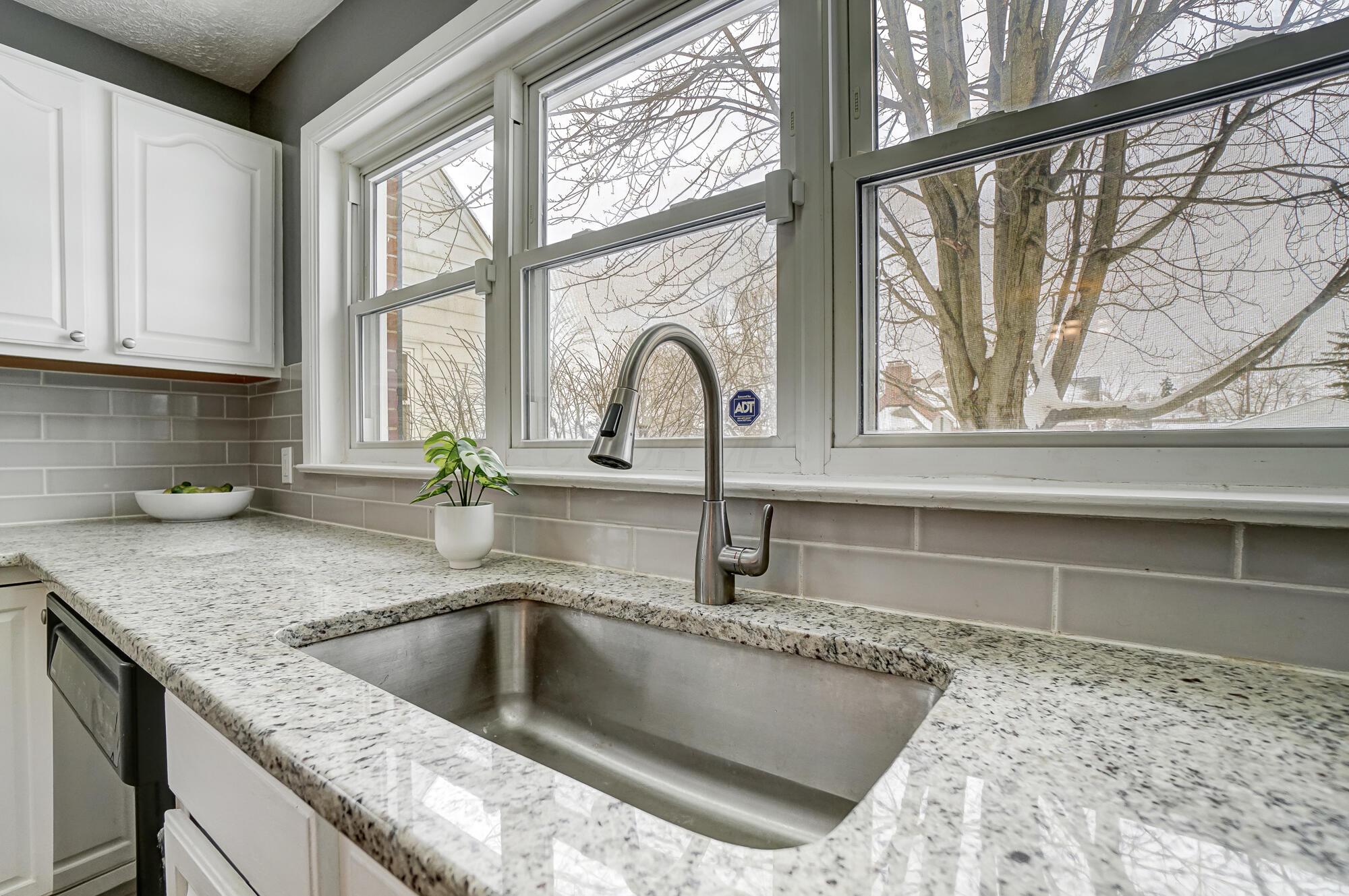 2990 Parkside Road Columbus, OH 43204 - Photo 12 of 34 Lovely large kitchen with wonderful windows above the giant sink.