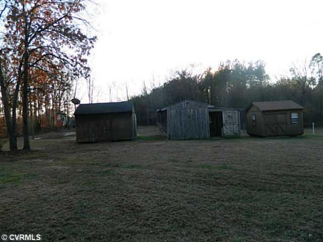 3607 Pacetown Road Sandy Hook, VA 23153 - Photo 20 of 22 Exterior Back - Garage with concrete floor, workshop, shed...HEATED.