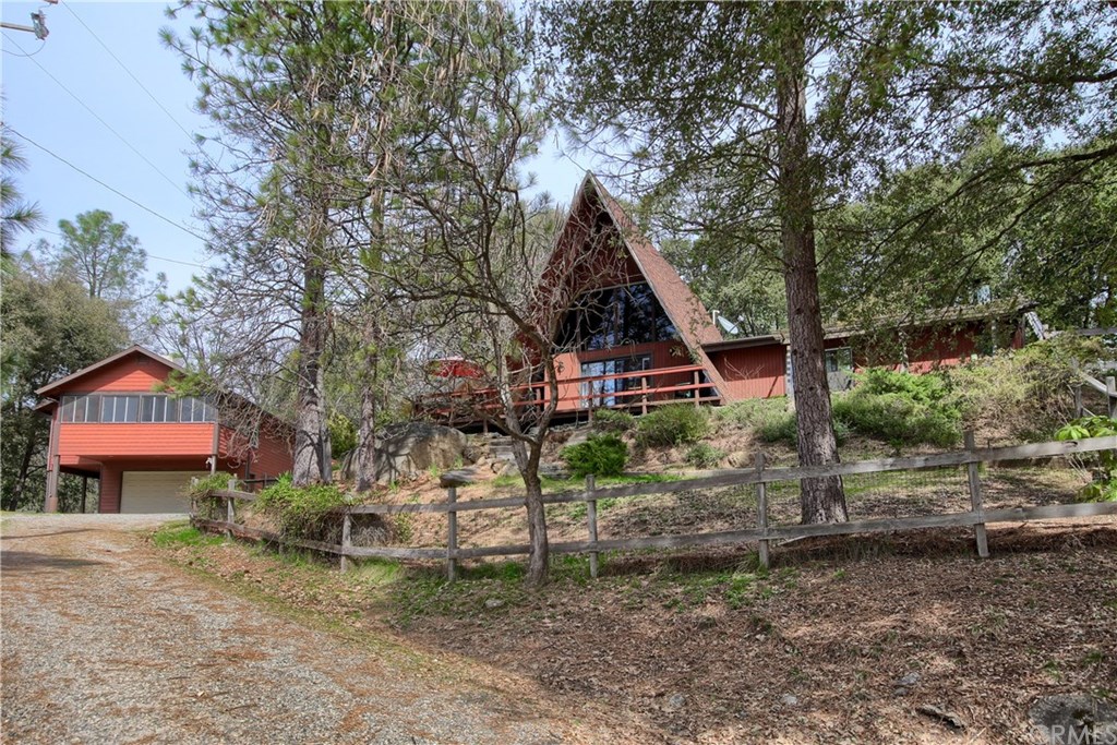 Home plus permitted apartment above garage on almost 4 acres