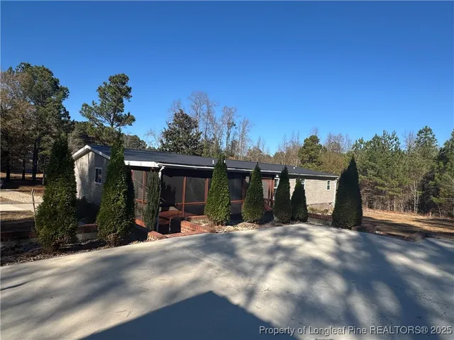 a view of a wooden deck with a bench