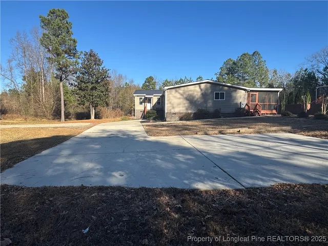 a view of street with a large tree