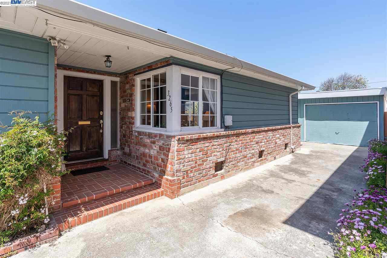3265 Fillmore Street Alameda, CA 94501 - Photo 1 of 1 a front view of a house with a garage