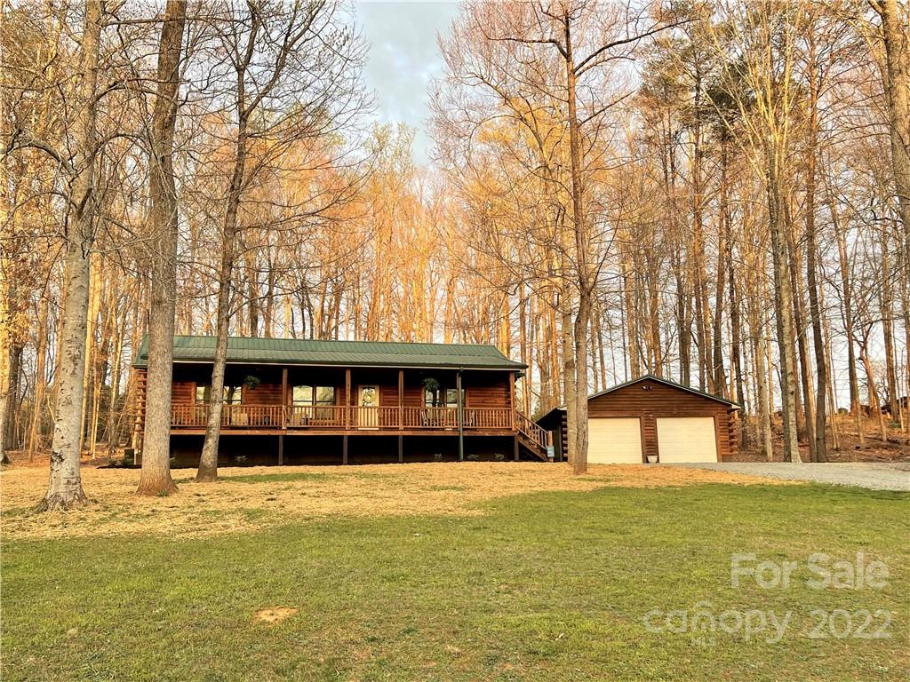 a front view of a building with a ocean view