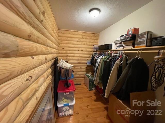 357 Cinnamon Ridge Rutherfordton, NC 28139 - Photo 22 of 40 a view of walk in closet with clothes and shoes