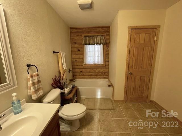 357 Cinnamon Ridge Rutherfordton, NC 28139 - Photo 23 of 40 a bathroom with a sink toilet and shower