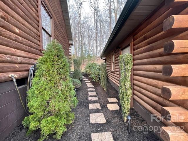 357 Cinnamon Ridge Rutherfordton, NC 28139 - Photo 27 of 40 a view of a pathway of a house with a garden