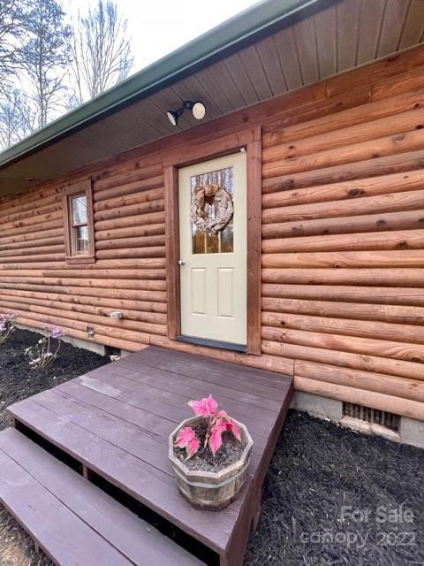 357 Cinnamon Ridge Rutherfordton, NC 28139 - Photo 31 of 40 a wooden bench sitting in front of a house