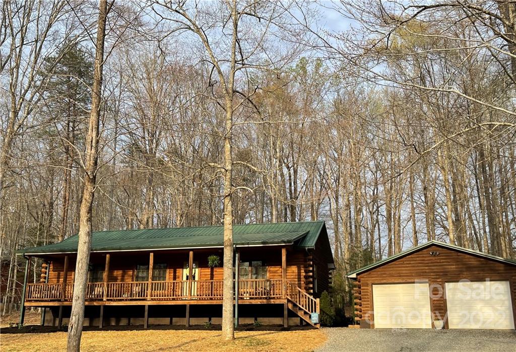 357 Cinnamon Ridge Rutherfordton, NC 28139 - Photo 34 of 40 a front view of a house with large windows