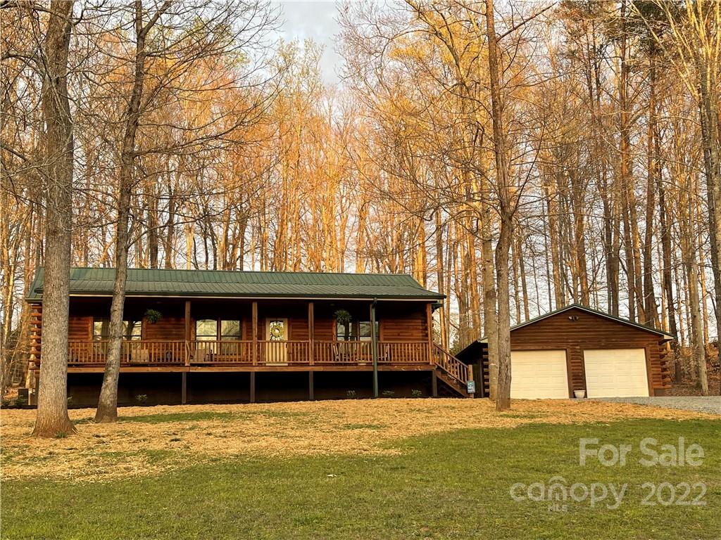 357 Cinnamon Ridge Rutherfordton, NC 28139 - Photo 35 of 40 a front view of a house with a yard