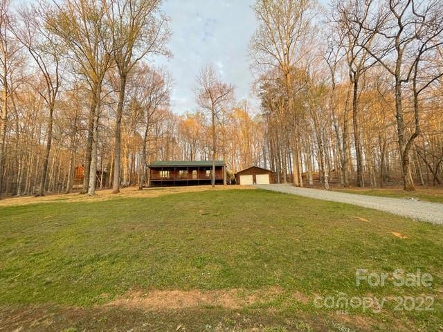 357 Cinnamon Ridge Rutherfordton, NC 28139 - Photo 37 of 40 a swimming pool with outdoor seating and yard