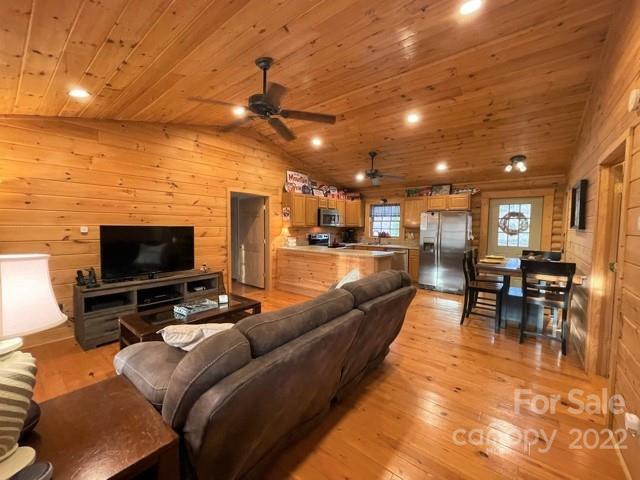 357 Cinnamon Ridge Rutherfordton, NC 28139 - Photo 7 of 40 a living room with furniture and a flat screen tv