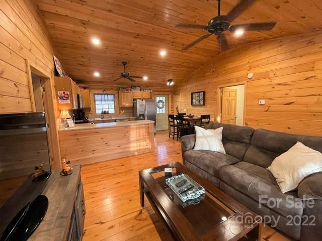 357 Cinnamon Ridge Rutherfordton, NC 28139 - Photo 10 of 40 a living room with furniture and kitchen view