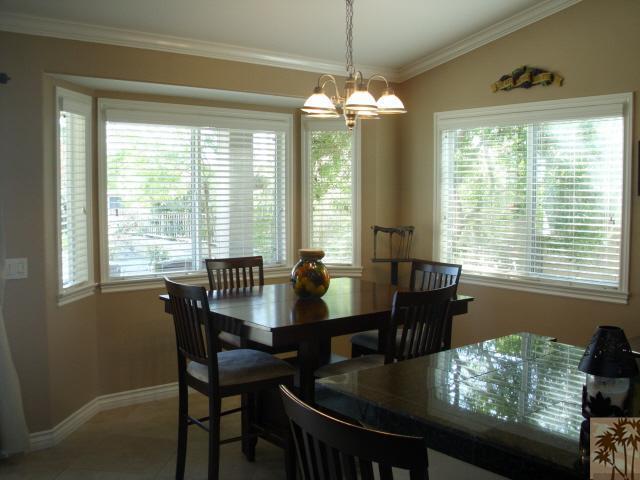 49364 Wayne Street Indio, CA 92201 - Photo 12 of 25 a view of a dining room with furniture window and outside view