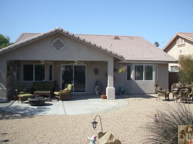 49364 Wayne Street Indio, CA 92201 - Photo 6 of 25 a front view of a house with a patio