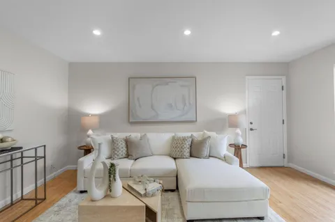 a living room with furniture and a couch