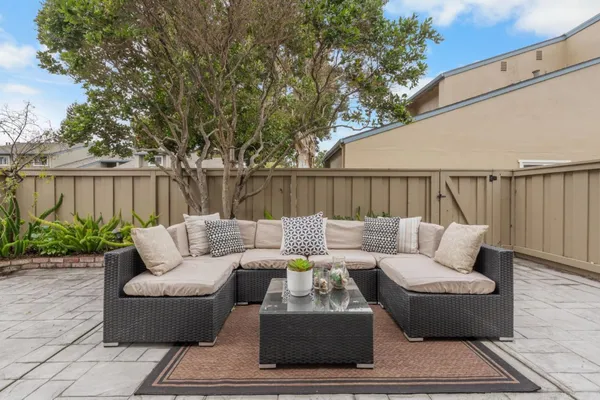 a view of a patio with couches and a patio