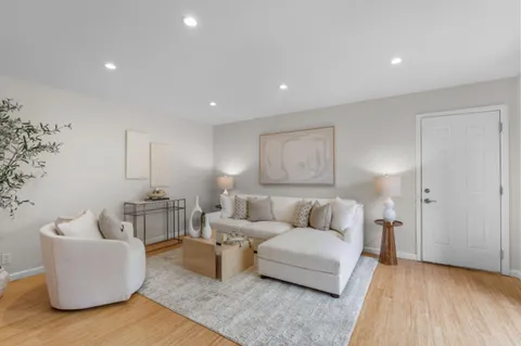 a living room with furniture and a couch