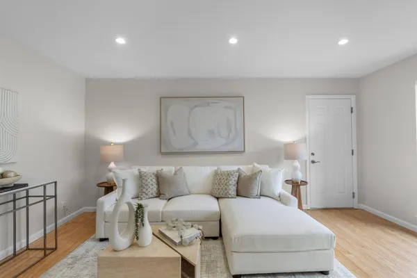 a living room with furniture and a couch