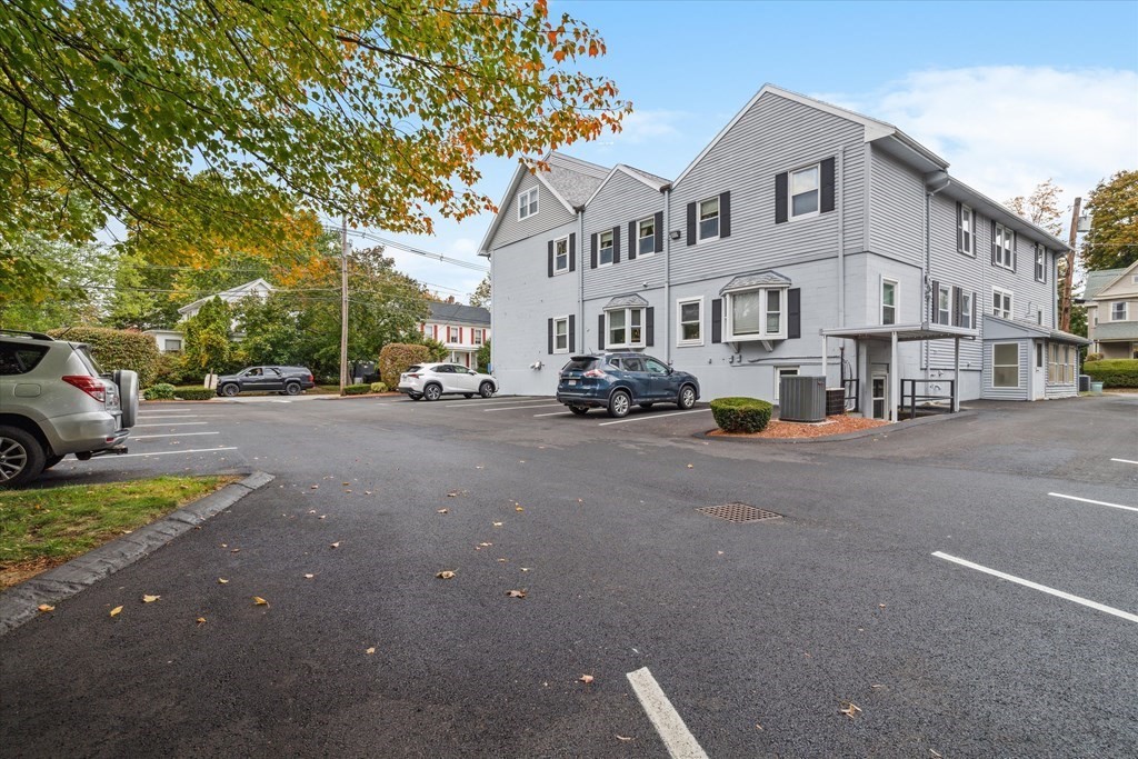 12 Benton Street, Unit 4 Stoneham, MA 02180 - Photo 32 of 35 a view of a street in front of a building